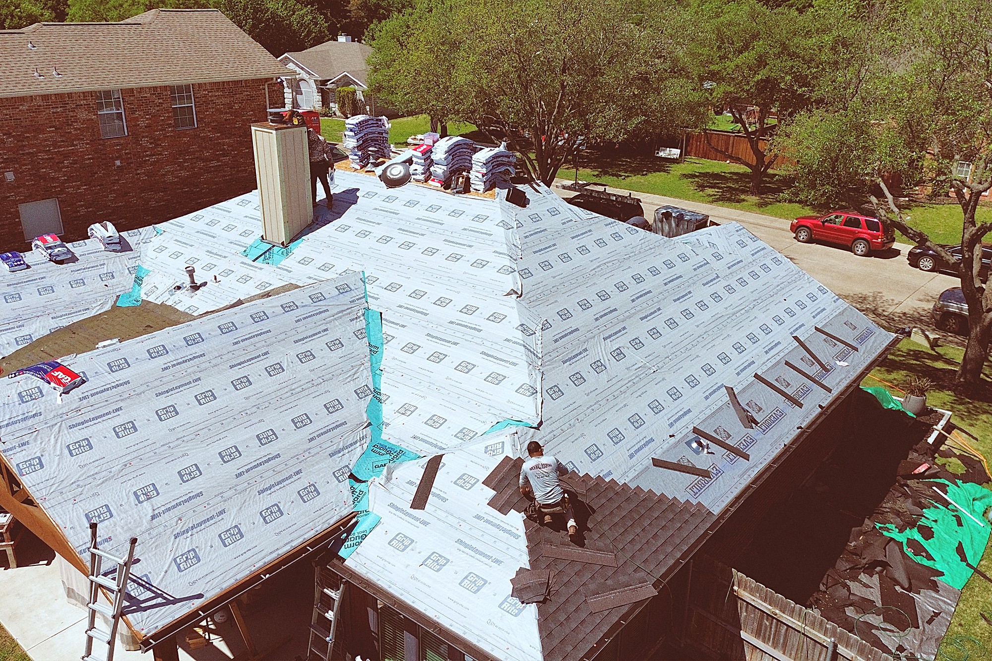 Rockwall Roofing & Gutters at work in Rockwall, TX